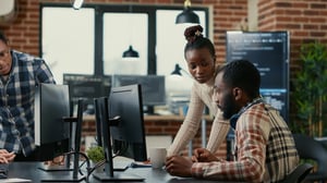ScaleSec computer engineers at work